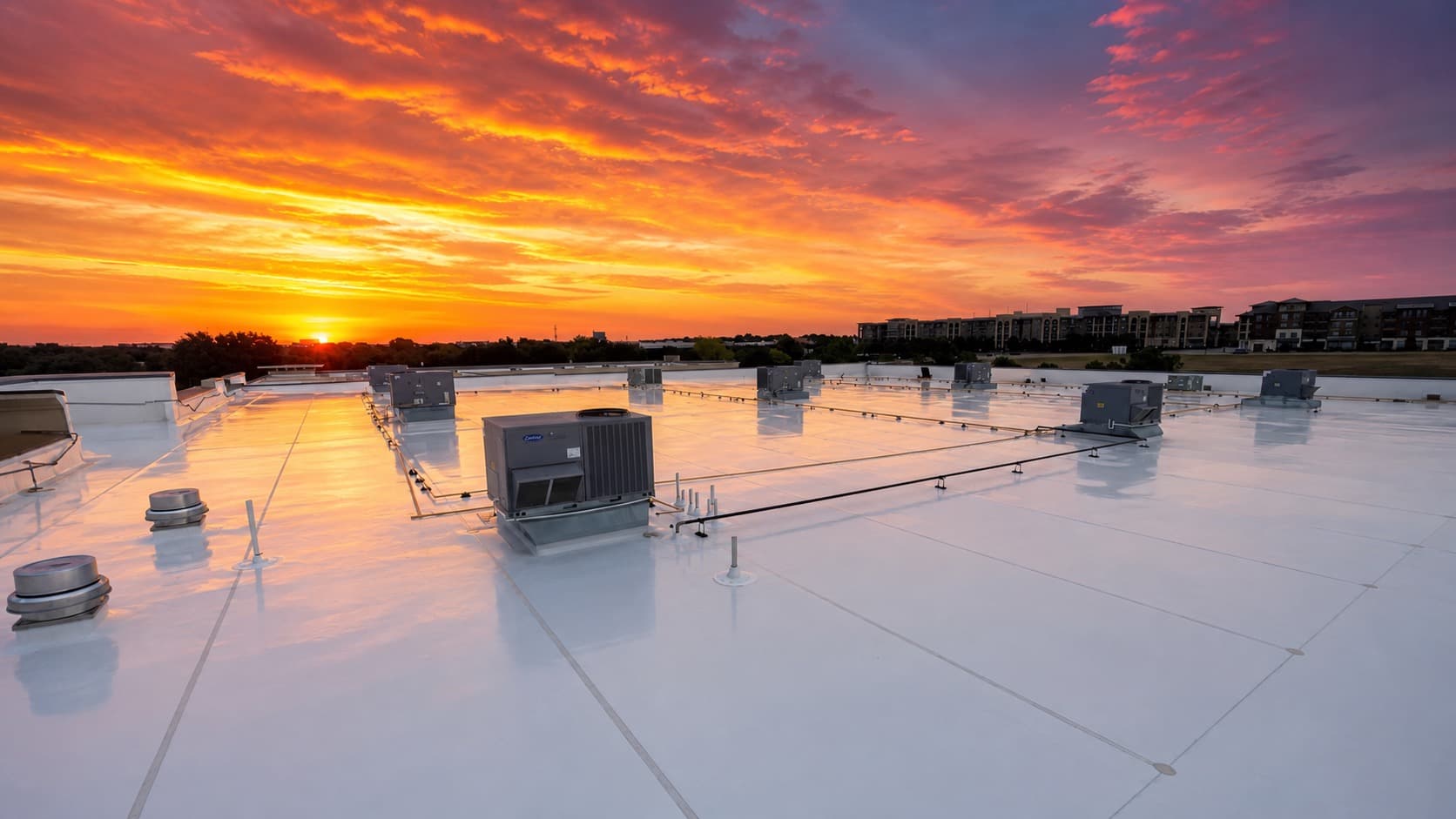 Completed North Texas commercial roof at sunset