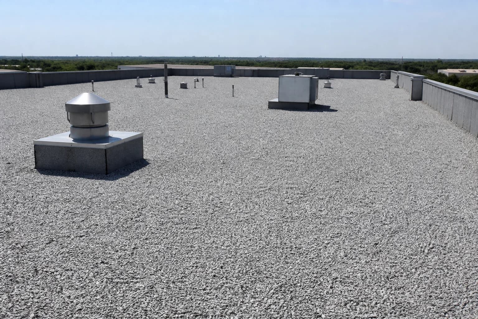 Representative built-up commercial roof with aggregate surfacing