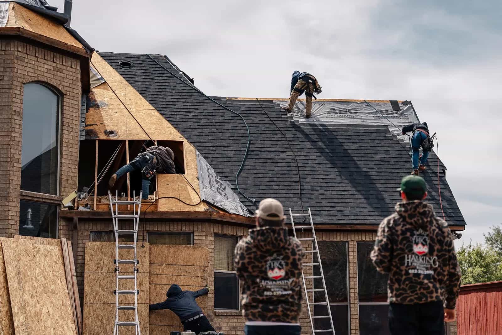 Hail King roofing crew installing a residential roof in North Texas