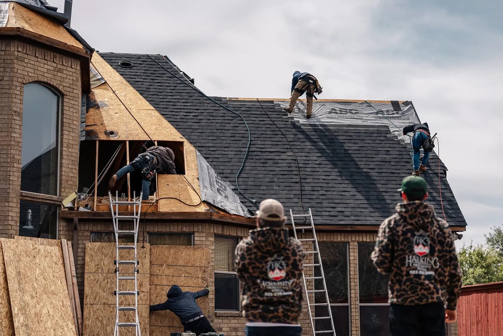 Hail King roofing crew installing a residential roof in North Texas