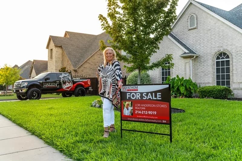 HailKing representative with a homeowner at a listed property