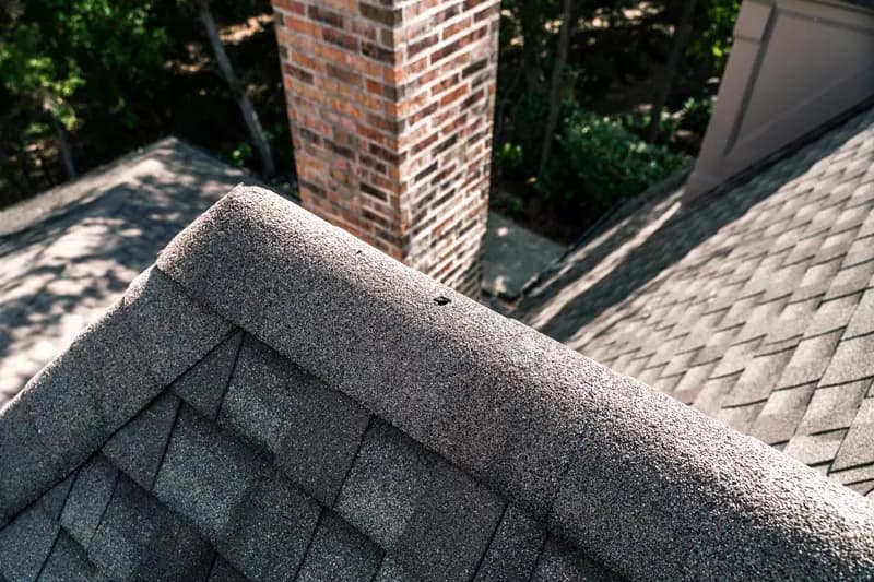 Flashed chimney and completed roof detail