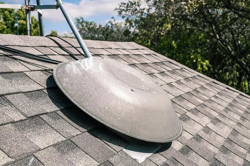 Roof penetration and shingle flashing detail