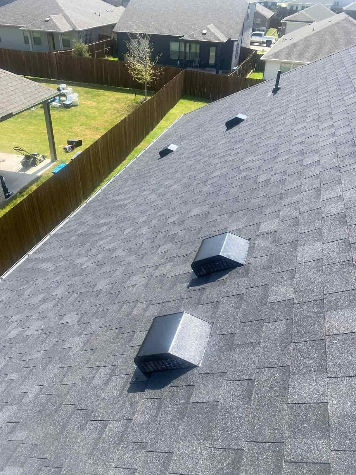 Completed asphalt roof documented with Najib Talhouk's roof damage repair review