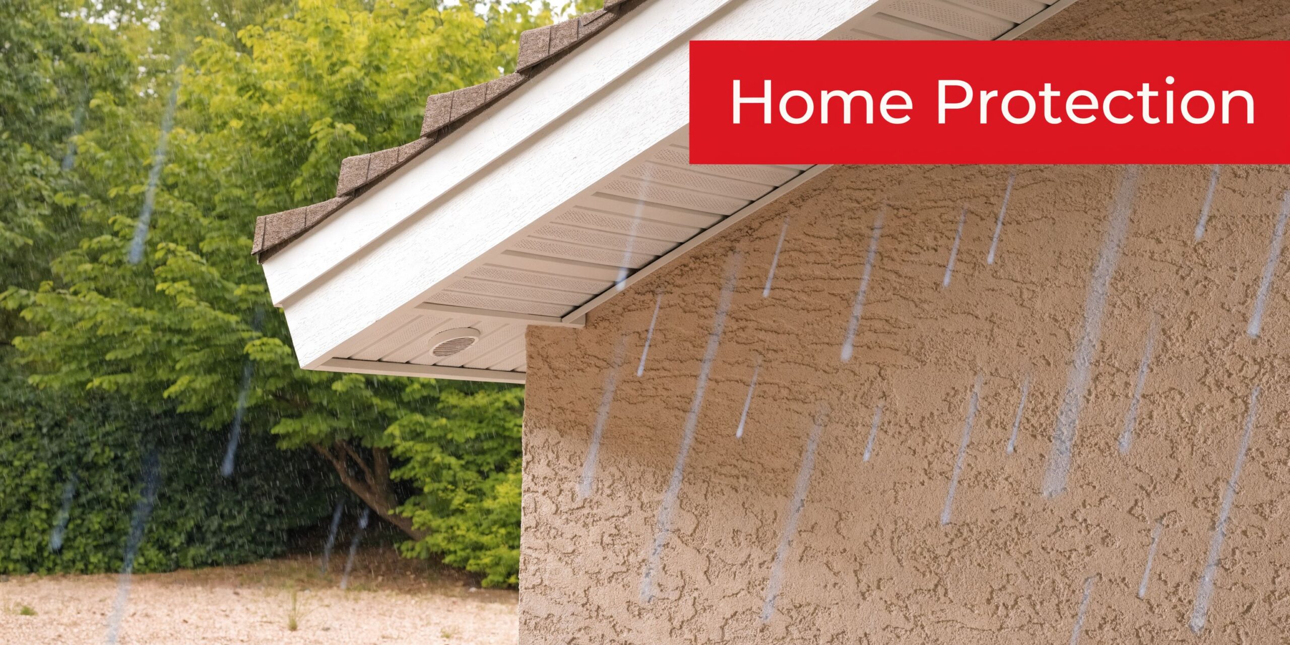 Rain falling onto the beige stucco wall and white soffit fascia of a suburban residential home.