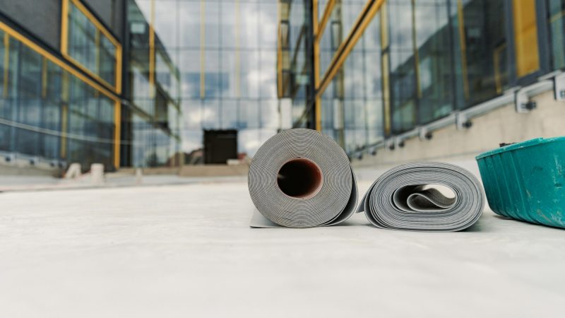 Synthetic PVC membranes for waterproof system. Details with hot air welding and membrane rollers